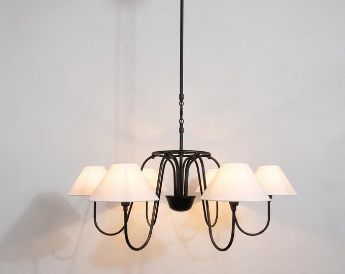The Matte Black chandelier captures a balance of power, beauty, and serenity.