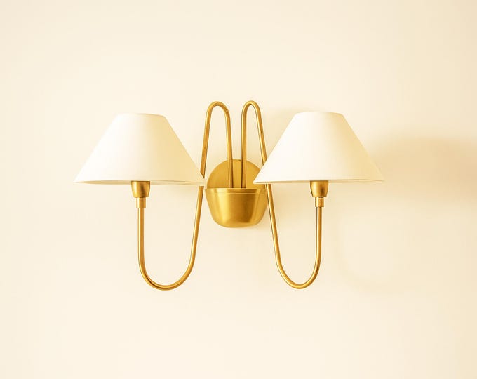 The Art of Lighting: Golden Unique Wall Sconces Unveiled
