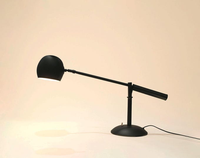 The Art of Lighting: Discover the See-Saw Table Lamp