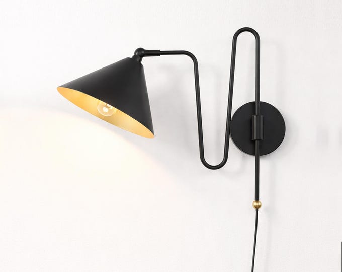 Sculpted Luxury — the Matte black Wall Sconce