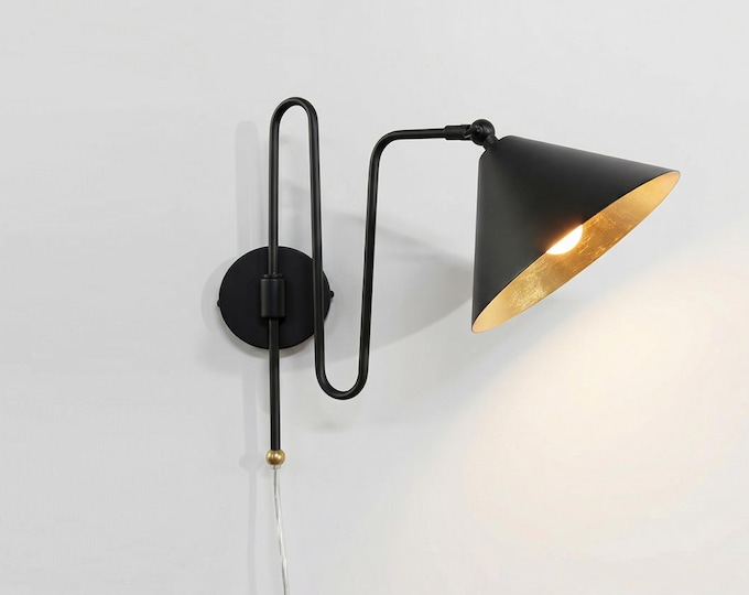 Sculpted Luxury — the Matte black Wall Sconce