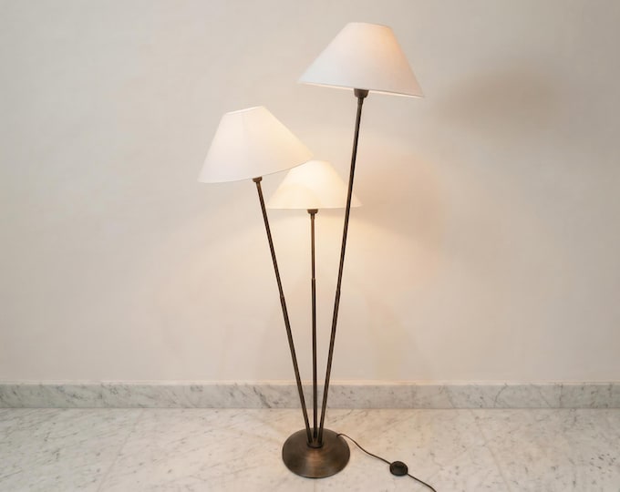 Enchanting Glow: The Brown Triple Shade Floor Lamp