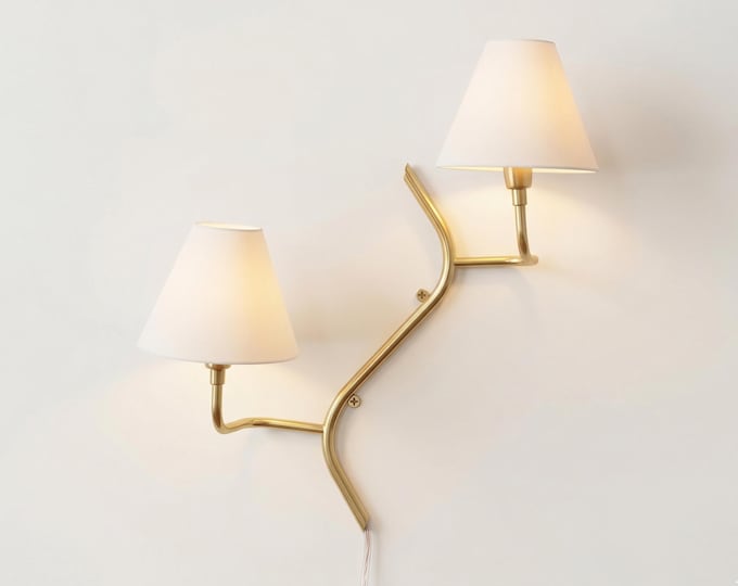 Unique Golden Wall Lamps: A Dual Touch of Elegance