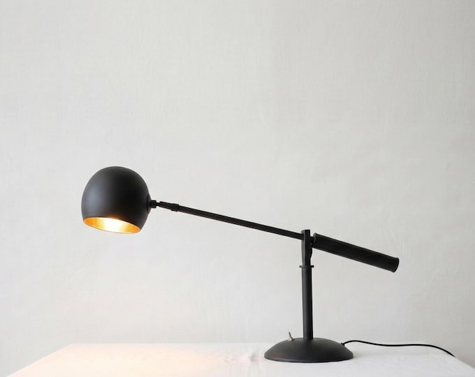 The Art of Lighting: Discover the See-Saw Table Lamp