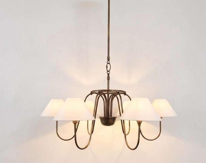 With captivating presence, the Brown chandelier speaks the language of luxury.