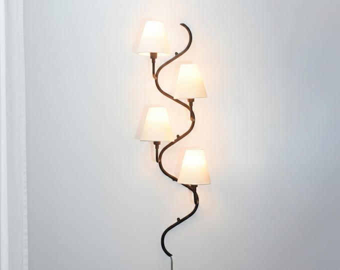 Embrace serene glow framed in distinctive matte black allure