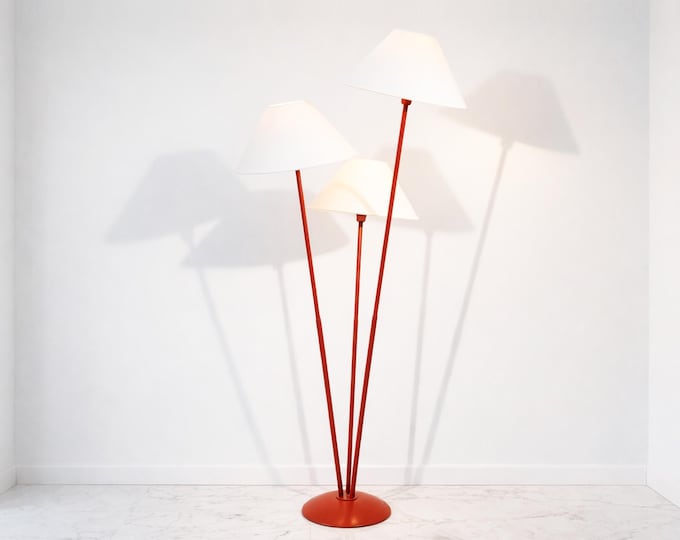 Luxe Lighting: The Allure of a Red Triple Shade Lamp
