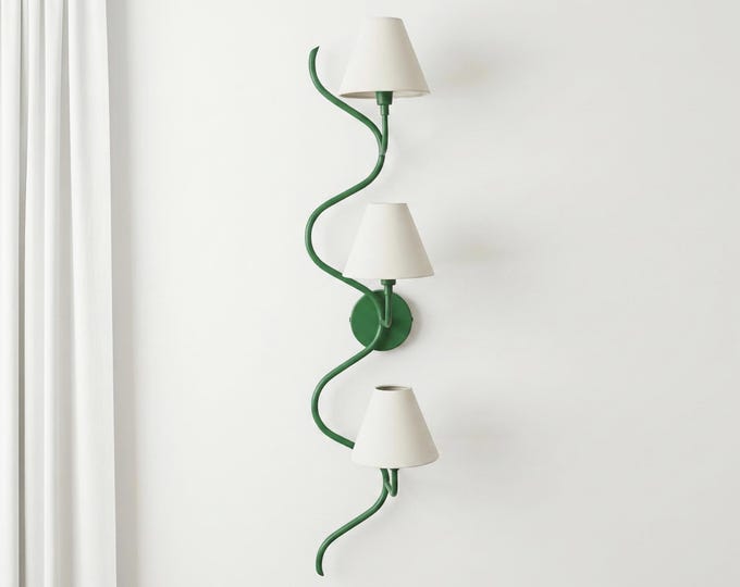 Where luxury meets light — the Green wall sconce.