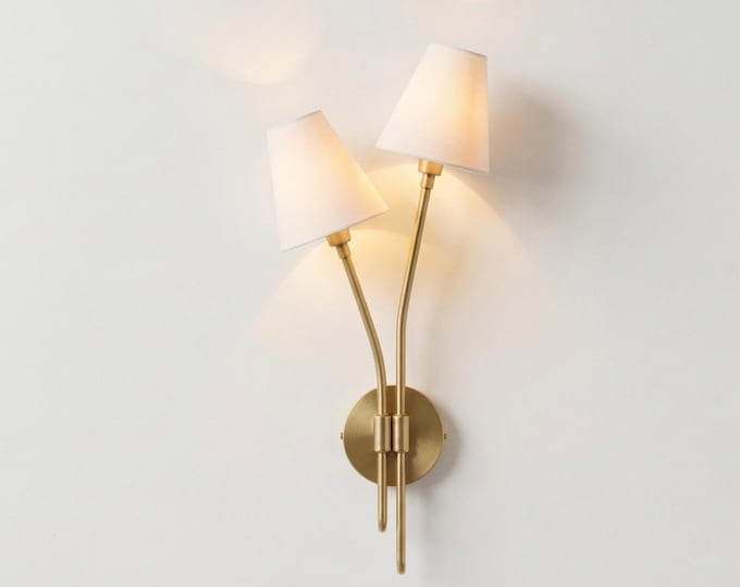 The warm embrace of Gold Brass brings artistry to illumination.