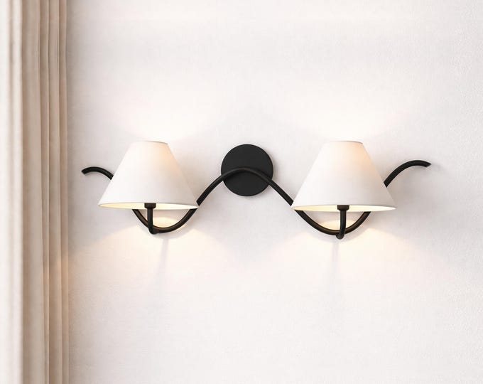 The Matte Black sconce Luxe Touch Your Wall Deserves