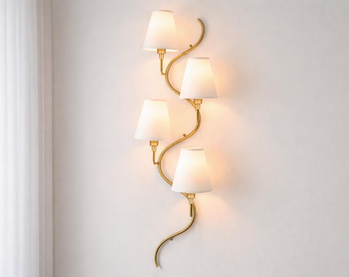 The Gold Brass wall sconce — where sophistication meets light.
