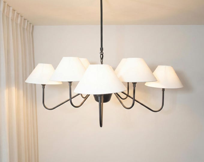 Embrace exquisite lighting craftsmanship in the timeless allure of Matte Black.