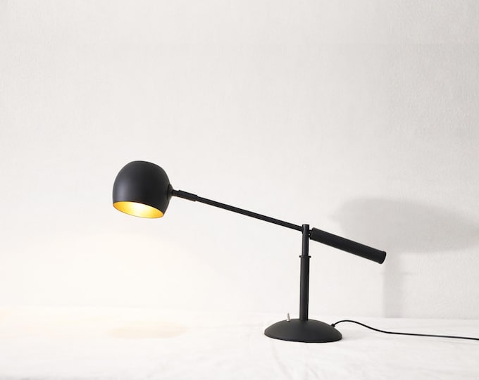 The Art of Lighting: Discover the See-Saw Table Lamp