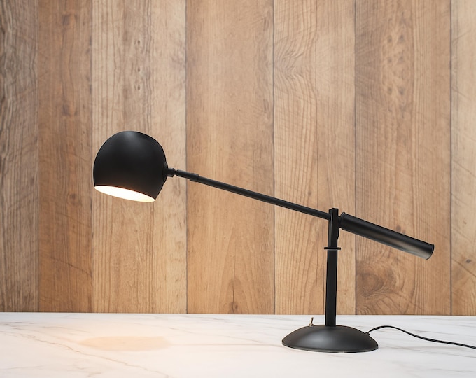 The Art of Lighting: Discover the See-Saw Table Lamp