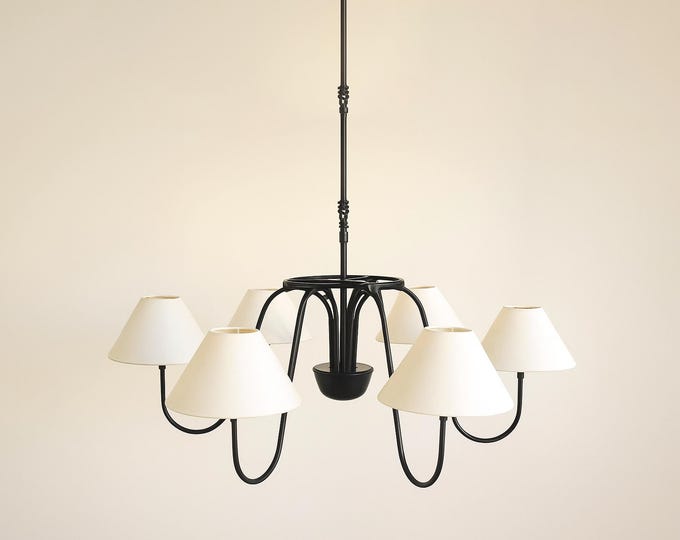 The Matte Black chandelier captures a balance of power, beauty, and serenity.