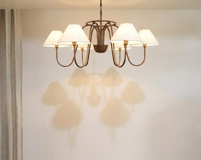 With captivating presence, the Brown chandelier speaks the language of luxury.