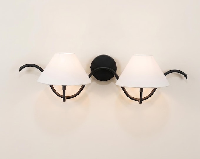 The Matte Black sconce Luxe Touch Your Wall Deserves