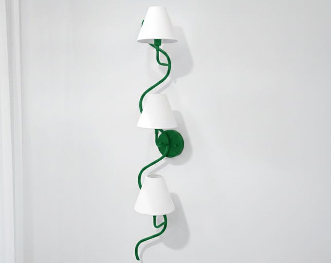 Where luxury meets light — the Green wall sconce.