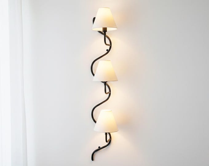 The art of illumination, reimagined in exquisite matte black.