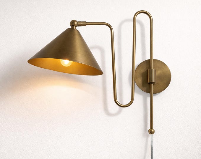 Sculpted Luxury — the Brass Brown Antique Wall Sconce