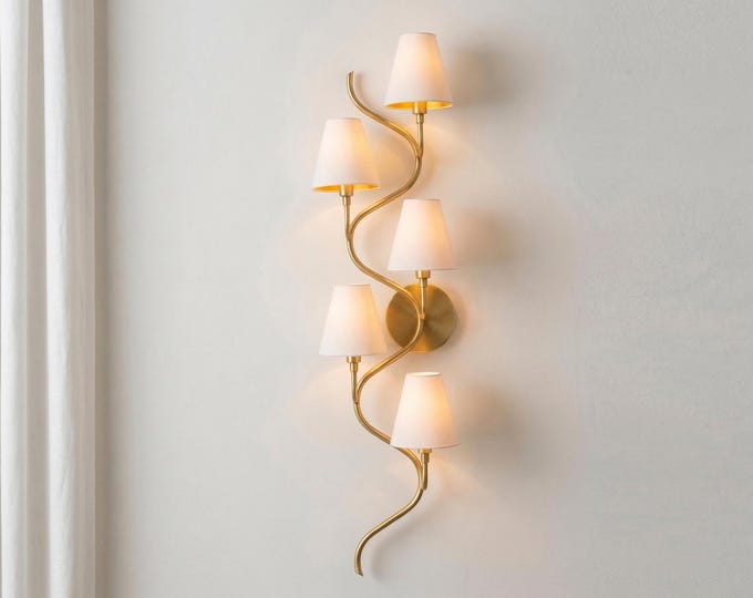 A masterpiece in metal — hand-finished in Gold Brass.