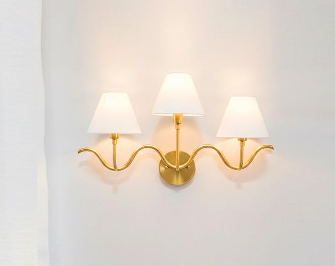 Opulent Wave Triple Sconce in Brushed Gold with White Cotton Fabric Shades