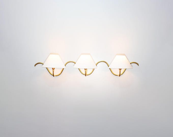 Unique Three Wall Lamp Ideas for Modern Interiors
