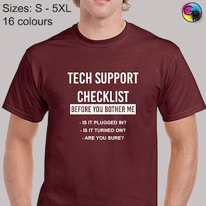 May include: A maroon t-shirt with white text that reads "Tech Support Checklist Before You Bother Me" and a list of questions: "Is it plugged in? Is it turned on? Are you sure?"
