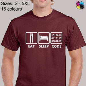 May include: Burgundy t-shirt with a white graphic that says "Eat Sleep Code" with binary code for "Code".
