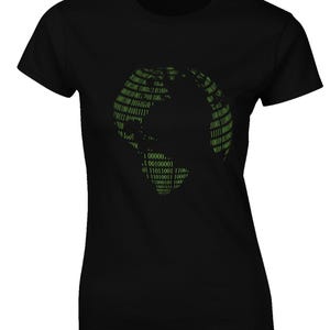 May include: Black t-shirt featuring a green graphic of a globe made of binary code.