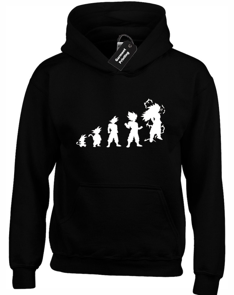 May include: Black hooded sweatshirt with a white graphic of the evolution of a popular anime character. The graphic shows the character in different stages of development, from a small, child-like form to a powerful, adult form.