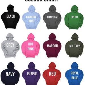 May include: Color chart showing 12 different hoodie colors. The colors are: black, carolina blue, charcoal, green, grey, hot pink, maroon, military, navy, purple, red, and royal blue.