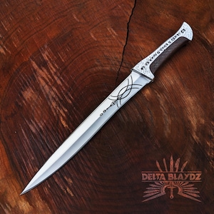 Handmade Paul Atreides Crysknife Replica: Dune Movie Carbon Steel Short Sword with Leather Sheath
Dune Knives: Movie Replica Handmade Knives | Gift for Men | Birthday Gift | Free Sheath | Movie Props | Christmas Gift | Dune 2024 Knife | Personalized Knife | Gift for Him | Anniversary Gift | Wedding Gift | Outdoor Knife | Hunting Knife | Groomsmen Gift Knife | Best Men Gift