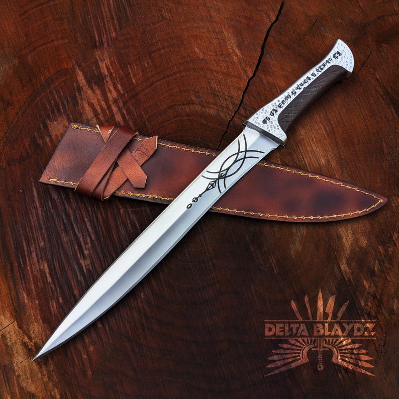 Handmade Paul Atreides Crysknife Replica: Dune Movie Carbon Steel Short Sword with Leather Sheath
Dune Knives: Movie Replica Handmade Knives | Gift for Men | Birthday Gift | Free Sheath | Movie Props | Christmas Gift | Dune 2024 Knife | Personalized Knife | Gift for Him | Anniversary Gift | Wedding Gift | Outdoor Knife | Hunting Knife | Groomsmen Gift Knife | Best Men Gift