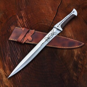 Handmade Paul Atreides Crysknife Replica: Dune Movie Carbon Steel Short Sword with Leather Sheath
Dune Knives: Movie Replica Handmade Knives | Gift for Men | Birthday Gift | Free Sheath | Movie Props | Christmas Gift | Dune 2024 Knife | Personalized Knife | Gift for Him | Anniversary Gift | Wedding Gift | Outdoor Knife | Hunting Knife | Groomsmen Gift Knife | Best Men Gift