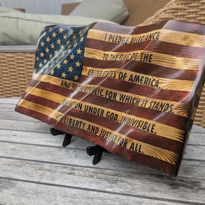 Small US wavy Flag with Pledge. Stand included