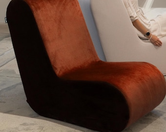 Orange chair, modern lounge chair, funky chairs, comfy lounge chair, relaxing chairs, armless chair, slipcovered chair, floor lounge chair