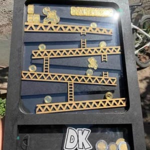 Donkey Kong, Sparschwein, Spardose, Sparschwein. Laserfeilen zur Herstellung eines Sparschweins aus dem Nintendo-Spiel Donkey Kong