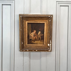 Antique portrait study of a boy practising the violin