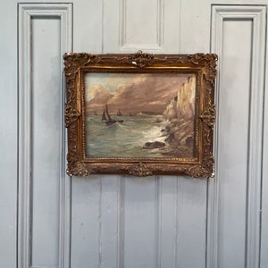 Antique French coastal seascape of sailing boats in rough weather signed Biot