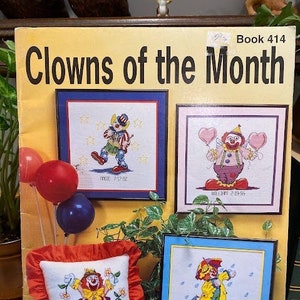 Clowns van de maand - in kaart gebrachte ontwerpen voor getelde kruissteek en naaldpunt, Kappie Originals Ltd. Boek 414, copyright 1991