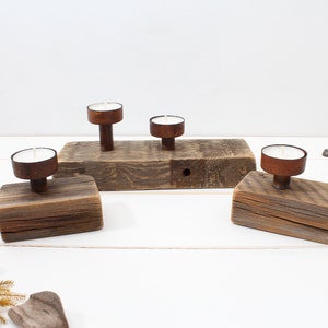 Rustic tealight holders made of reclaimed wood with rusty patina - set of 4