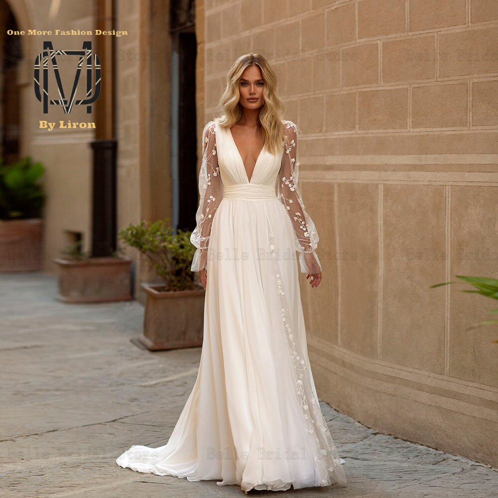 Affordable wedding dresses with best sale sleeves