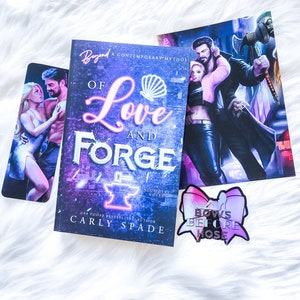 May include: A purple and blue book titled "Of Love and Forge" by Carly Spade, a USA Today bestselling author. The book is a contemporary mythos novel. The book is surrounded by stickers, including a sticker with a mermaid and a sticker with a bow.