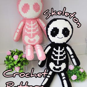 May include: Two crochet skeleton dolls, one pink and one black, with white bone detailing. The dolls have rounded heads and limbs, and the text "Skeleton Crochet Pattern" is written in a cursive font.