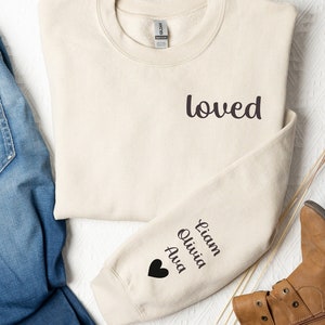 personalized loved sweatshirt with names on sleeve