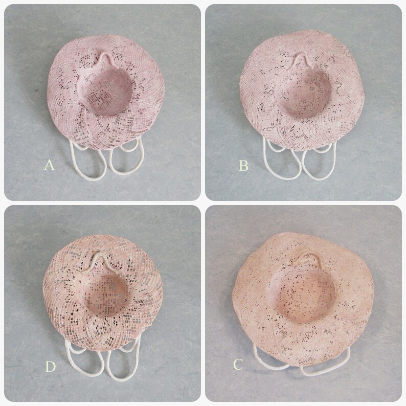 May include: Four pink straw hats with white trim and a white string handle. The hats are arranged in a grid pattern with the letters A, B, C, and D labeling each hat.