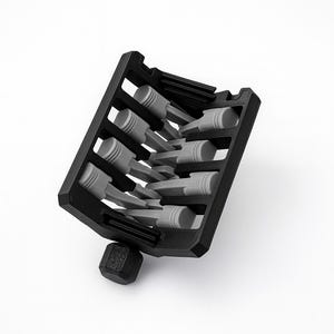 May include: A black and gray tool organizer with multiple compartments holding gray cylindrical objects. The organizer is angled, with a square base and a rectangular frame. The background is plain white.