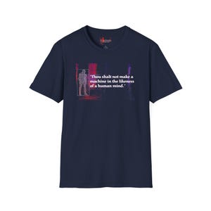 May include: Dark blue t-shirt with the quote "Thou shalt not make a machine in the likeness of a human mind." The design includes a person outline and abstract shapes in purple and red hues.