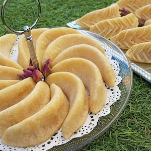 Moroccan Cookies: Gazelle Ankles (كعب الغزال), also known in French as "cornes de gazelle." Soft almond stuffed pastry, Moroccan dessert